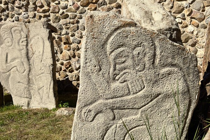 One of the Danzantes stones at Monte Alban, a human figure cut into the slab