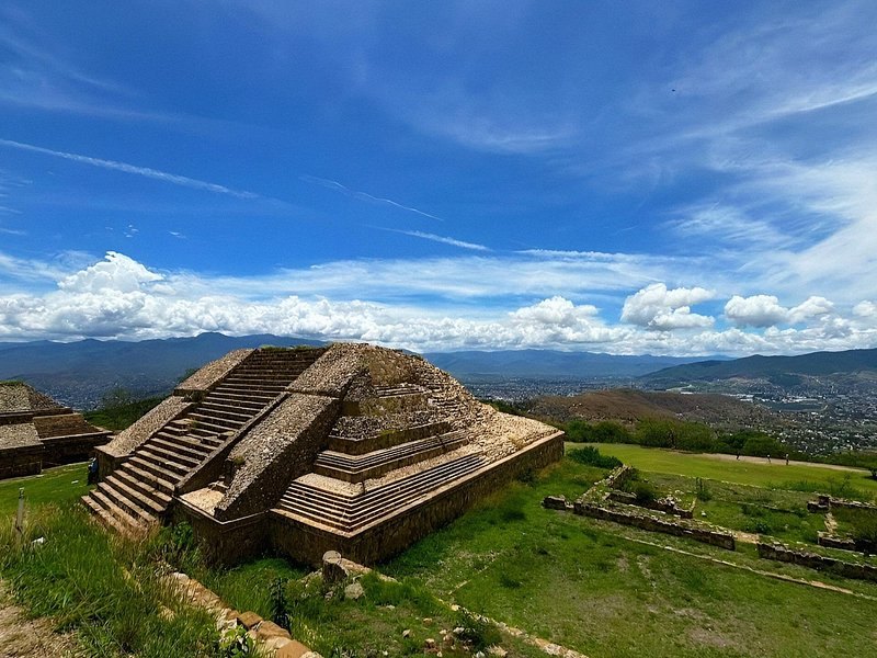 A stepped platform at Monte Alban from above, with mountains on the skyline