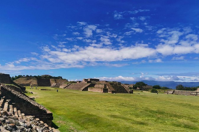 Worn stone steps at Monte Alban running up towards an open sky